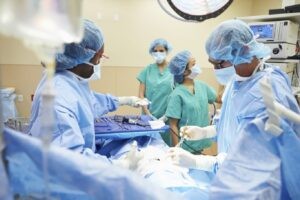 Image depicting doctors and surgical procedures.
