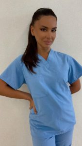 A photograph of Neera Yengibarian, a student in the Surgical Technology program at CBD College.