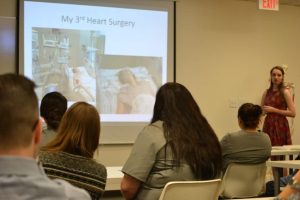 CBD College students collaborate with members of Beating Hearts Foundation in a PowerPoint presentation about their partnership.