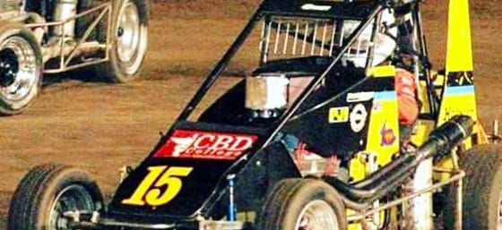 Close-up of Ashley Hazelton behind the wheel, representing CBD College in a thrilling race.