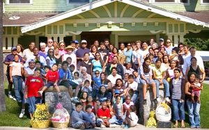 Exterior shot of Alexandria House with CBD College students and staff gathered outside, showcasing the partnership between the two organizations.