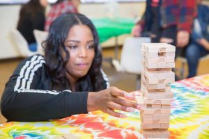 CBD College students immerse themselves in an engaging IQ game, strategizing and problem-solving together as part of the dynamic activities during Student Appreciation Day.