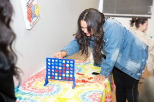 CBD College students showcase their artistic talents with 90s-themed crafts and activities during Student Appreciation Day.