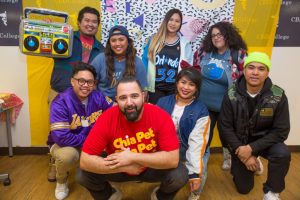 Group of students at CBD College wearing neon colors and funky accessories to celebrate Student Appreciation Day with a 90s theme.