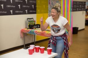 Students at CBD College take a break from classes to enjoy snacks and refreshments reminiscent of the 90s era.