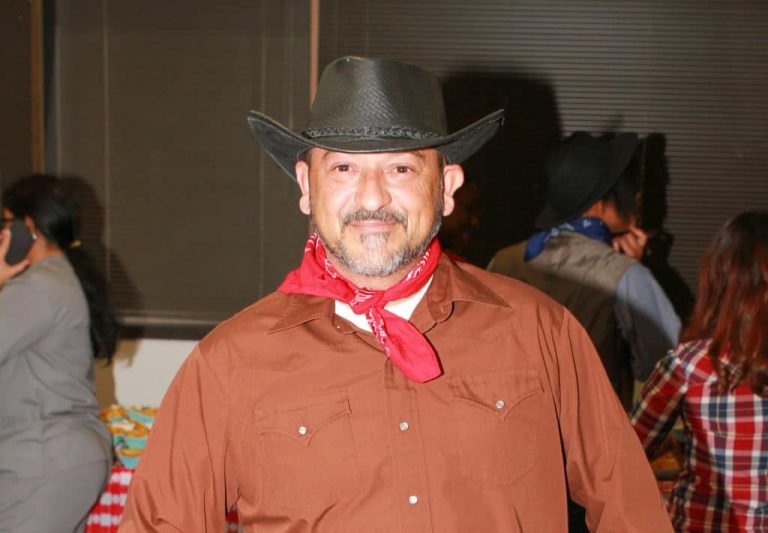 Close-up of students wearing cowboy hats and boots for Western Day at CBD College.