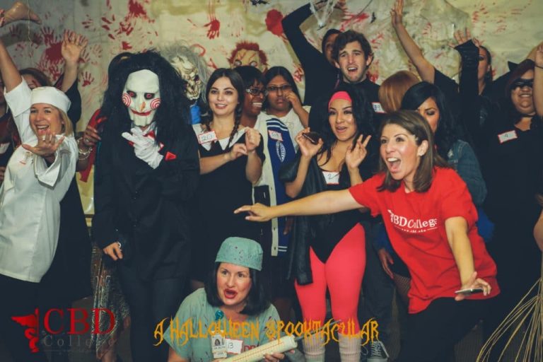 CBD College Halloween Spooktacular event with students in costumes.