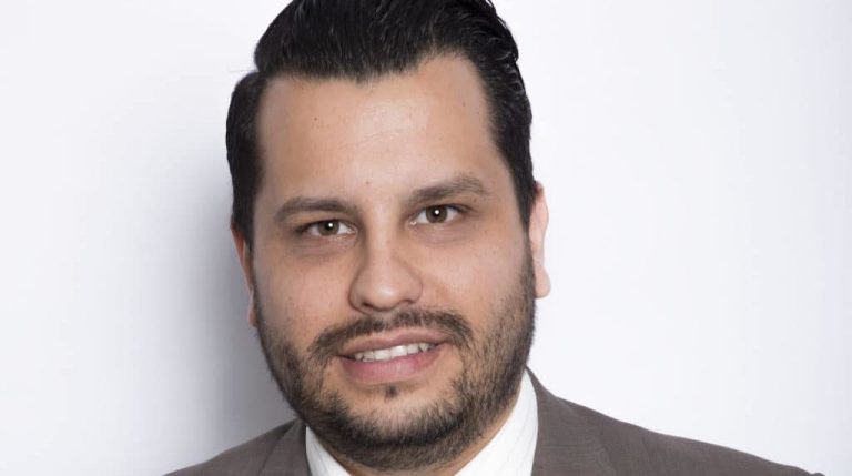 Image featuring Ivan Reynoso, the Director of Student Affairs and Career Services at CBD College, dedicated to supporting student success and professional development.