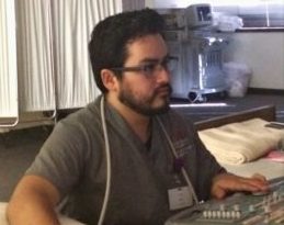 Julian Palacios, a Diagnostic Medical Sonography student at CBD College, conducts a scan on a patient during a practical session, gaining hands-on experience in ultrasound imaging.