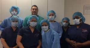 Group photo featuring Mr. Magdaleno (wearing a green shirt) alongside students from CBD College.