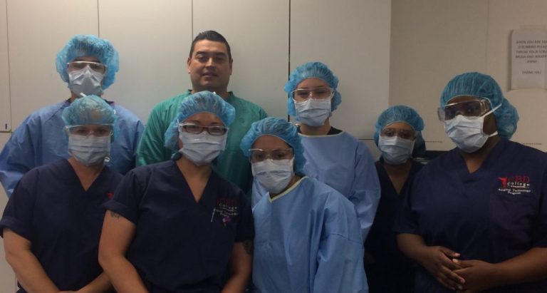 Group photo featuring Mr. Magdaleno (wearing a green shirt) alongside students from CBD College.