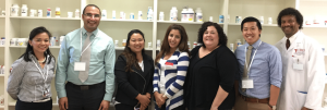 CBD College pharmacy students and professors gather for a group photo.