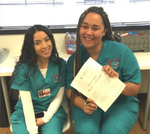 Image showcasing CBD College's successful 12-hour blood drive event, featuring enthusiastic volunteers and donors.
