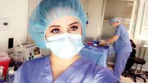 Image featuring Gigi Calderon, a medical assistant in the operating room, demonstrating professionalism and expertise in surgical support and patient care.