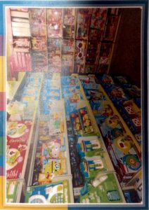 GIF depicting CBD College's lobby adorned with festive displays as donations pour in for the Toy Drive.