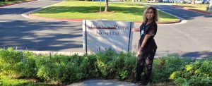 The image show Corynne Ramaker, a graduate of the Occupational Therapy Assistant program at CBD College.