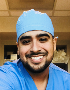 Image featuring Richard Tovar, a proud graduate of the Surgical Technician program at CBD College, celebrating his achievement and success.