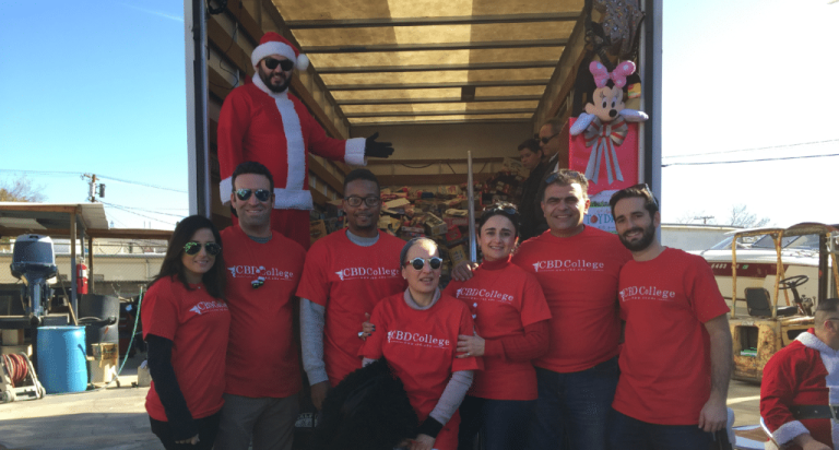 Students and professors from CBD College participating in a toy drive event.