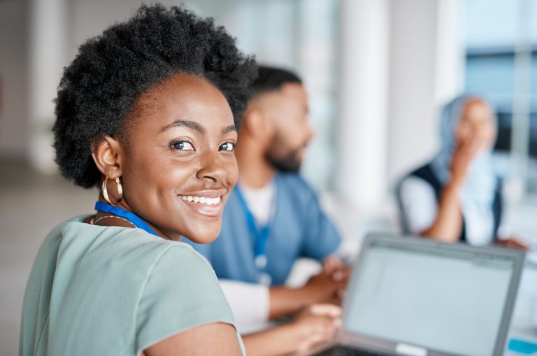 A female health science student studying at CBD College, engaged in academic activities.